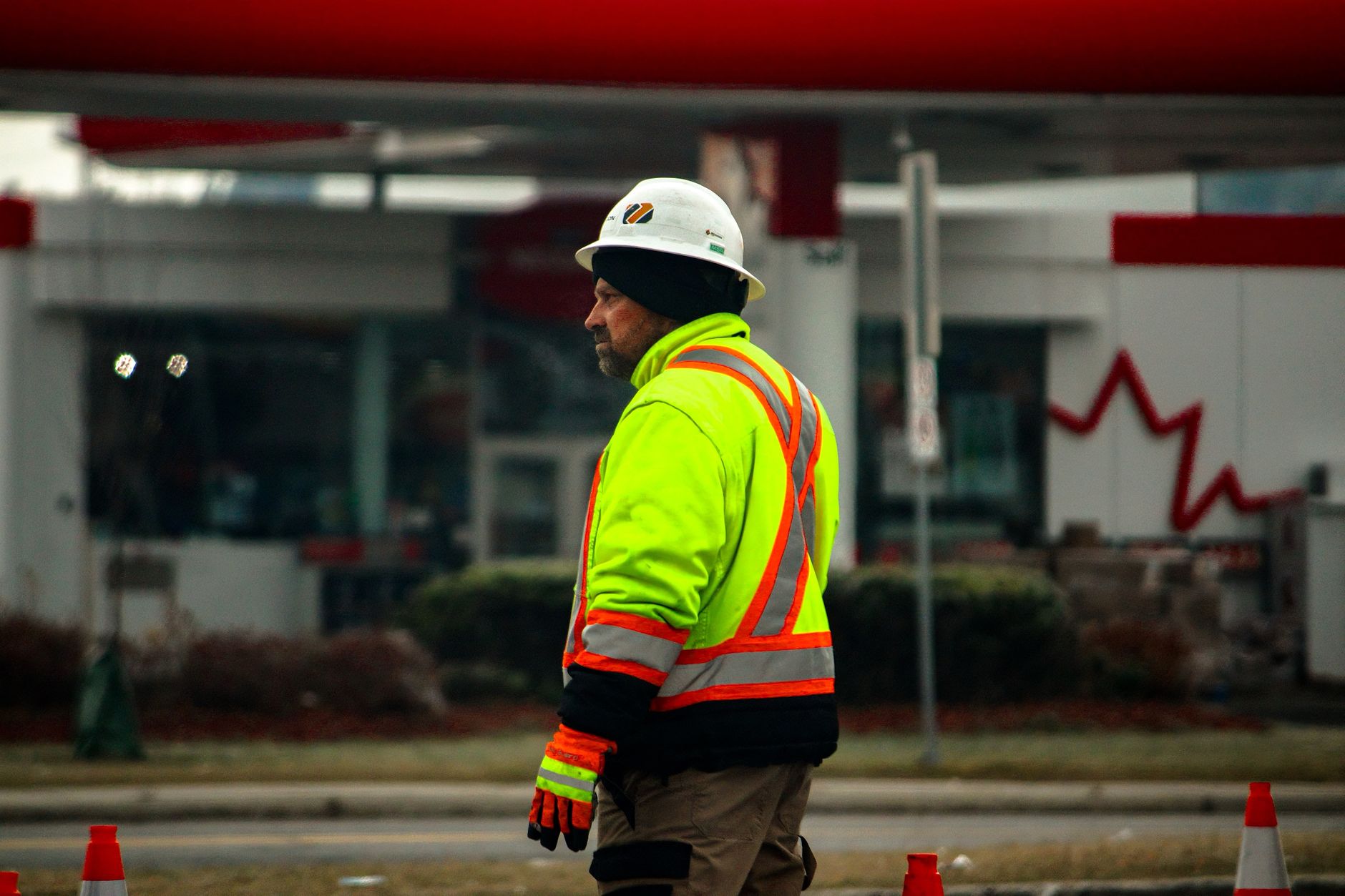 High-visibility workwear with custom printed logo for a construction company