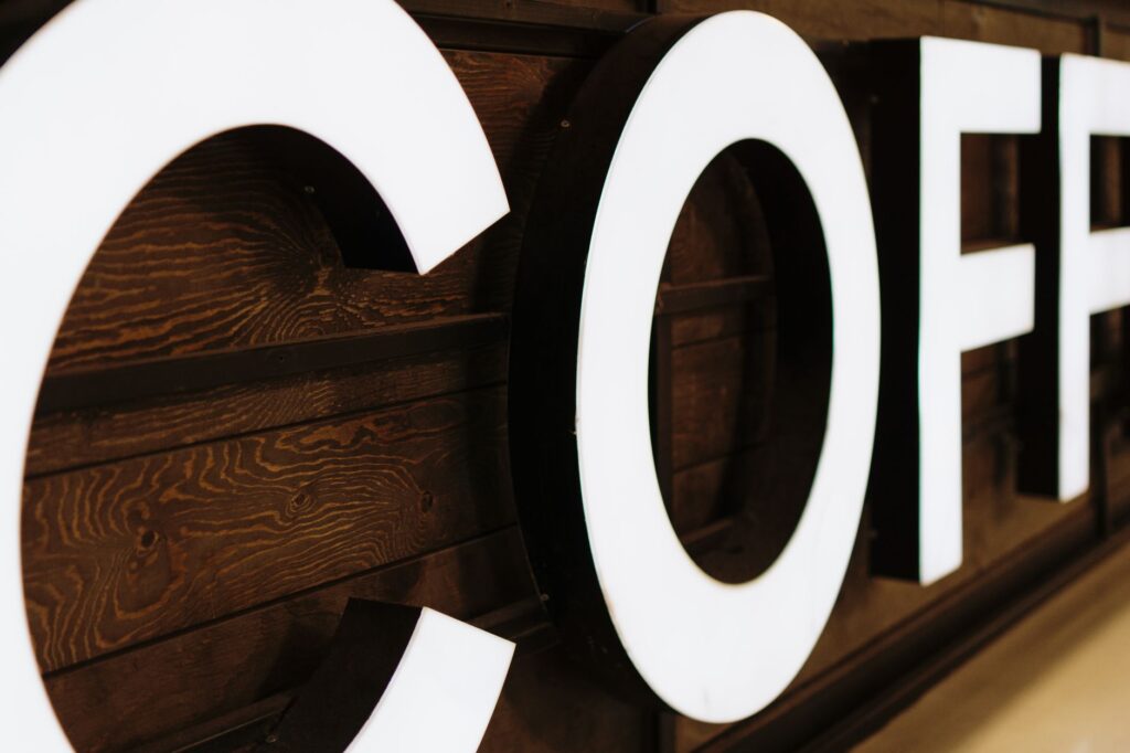Close-up of an illuminated 3D sign in a business interior