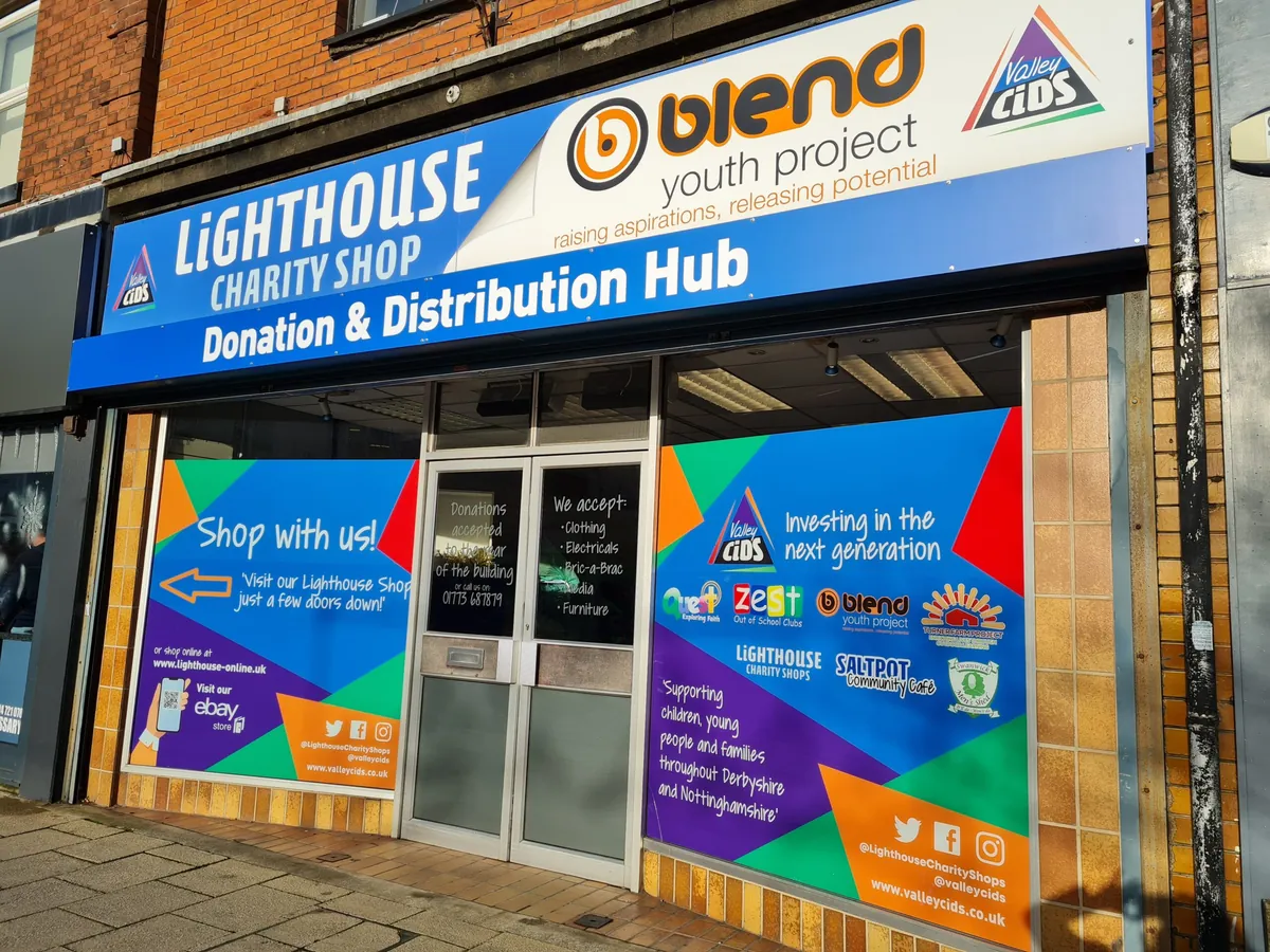 Full shopfront window graphics and fascia sign fitted for the Lighthouse Charity Shop