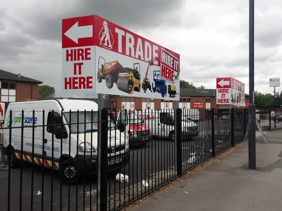 Exterior trade signage and directional boards fitted at a builders yard