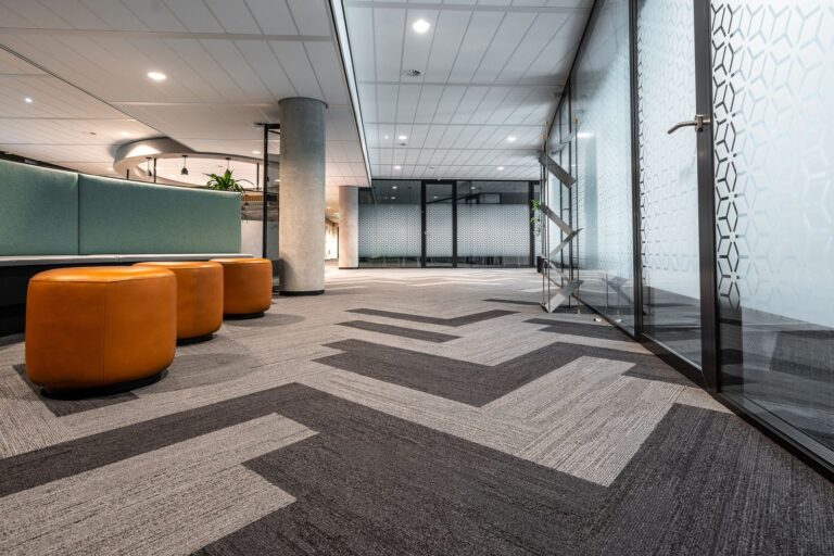 Glass manifestation on office glazed doors and screens in a modern UK building